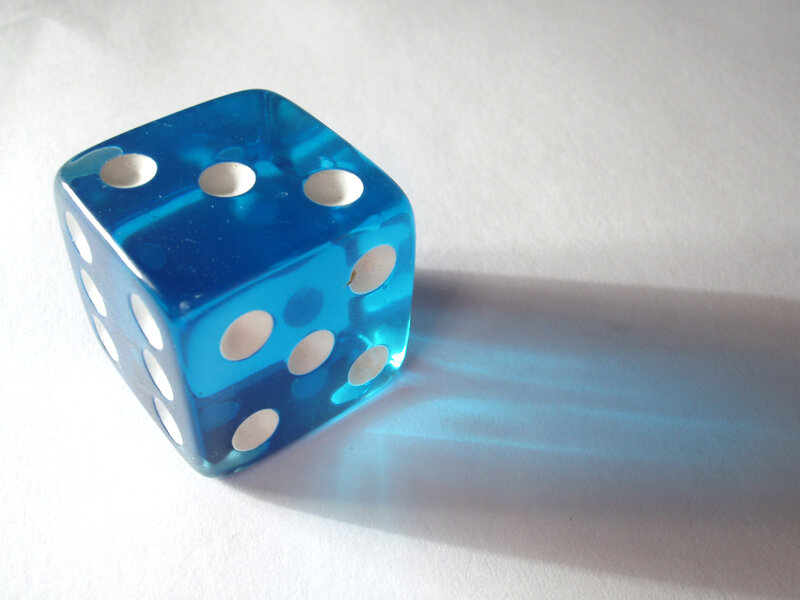 blue translucent dice on white