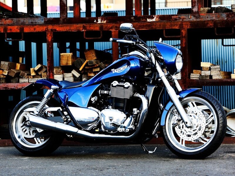 Blue Triumph Motorcycle — Industrial