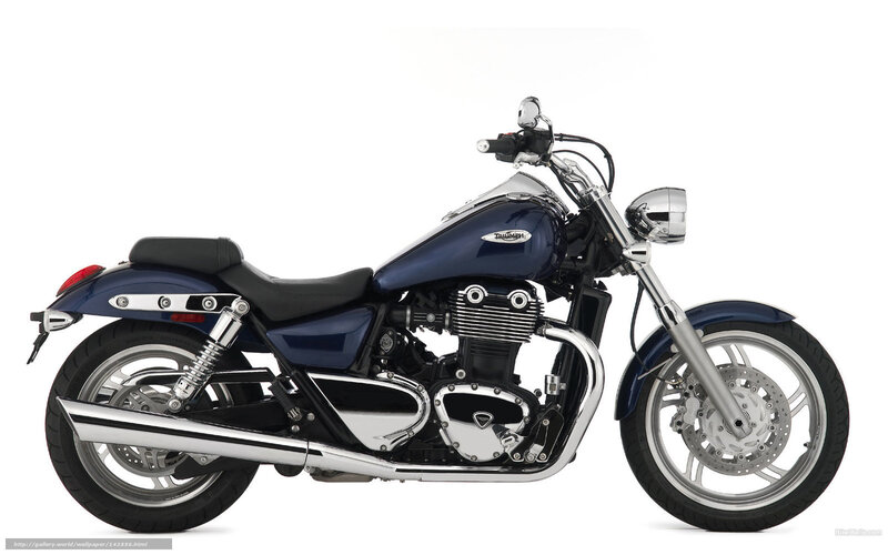 Blue Triumph motorcycle side view