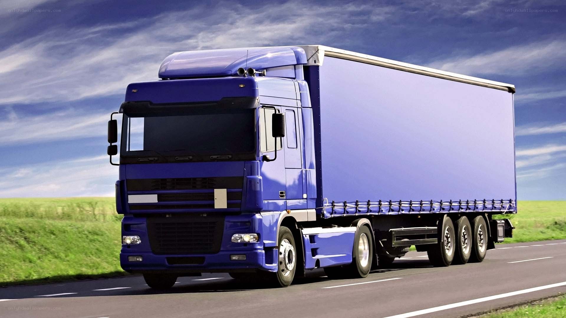 blue truck on highway
