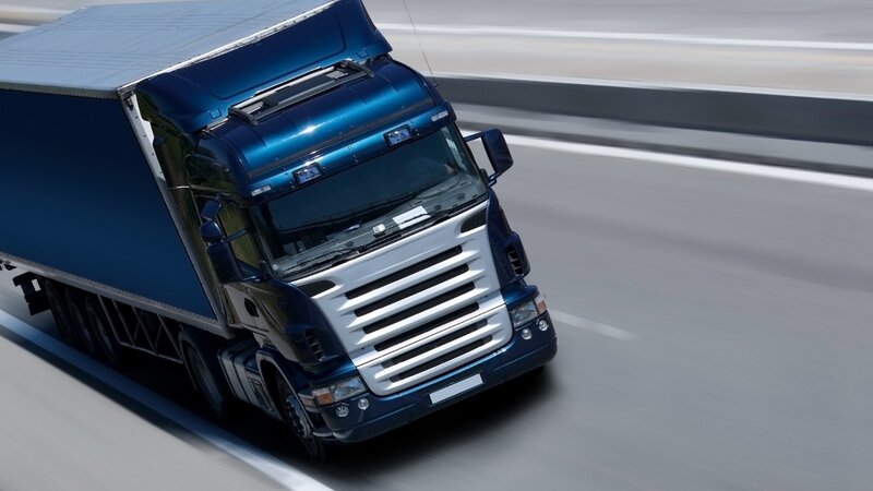 Blue truck on highway