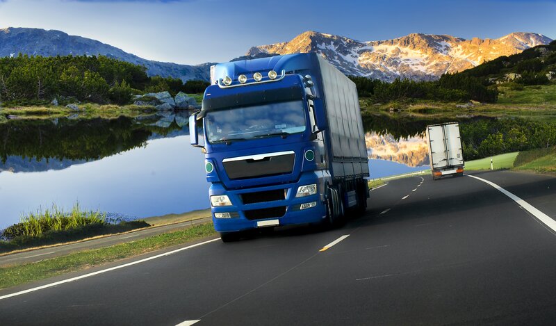 Blue Truck on Mountain Road