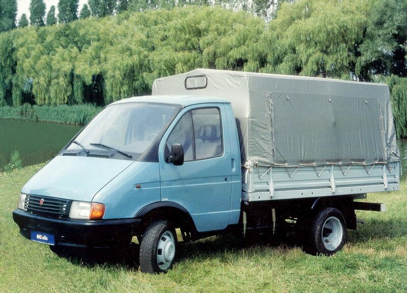 Blue truck with canvas cover