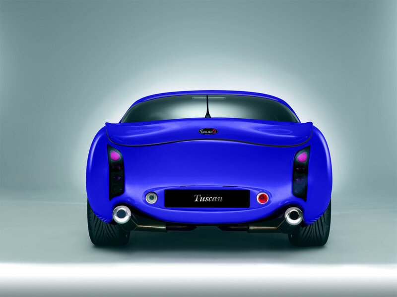 Blue Tuscan sports car rear view