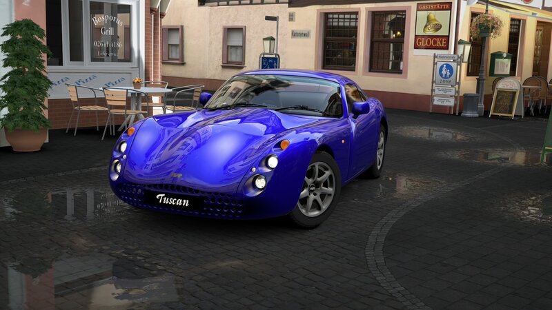 Blue TVR Tuscan on cobblestone street