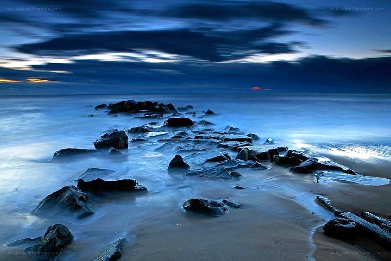 Blue twilight beach scene