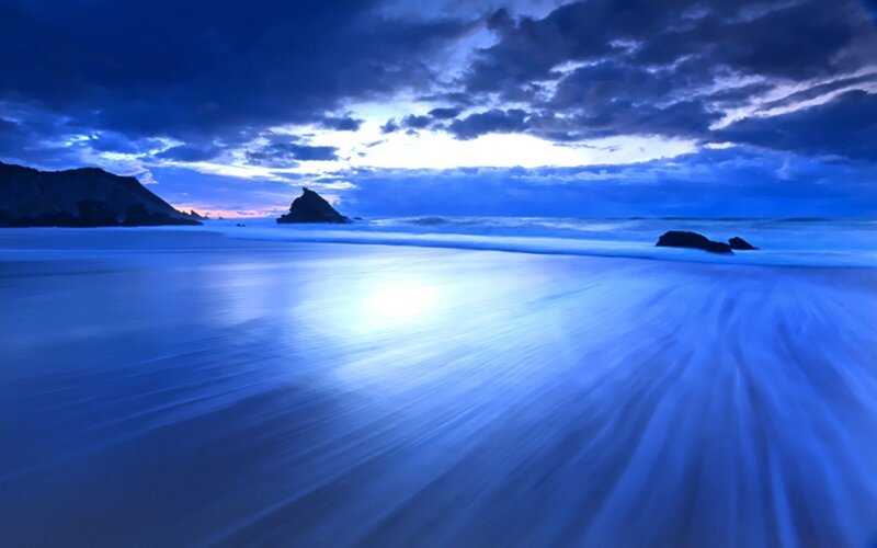 Blue twilight beach scene