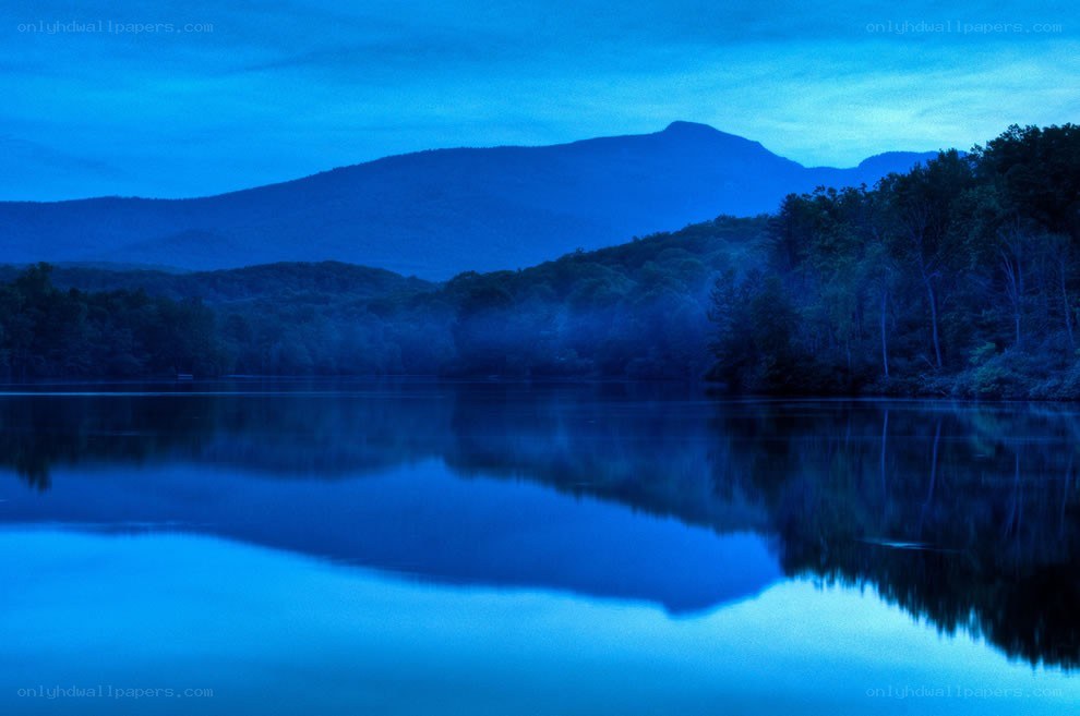 Blue twilight lake and mountains