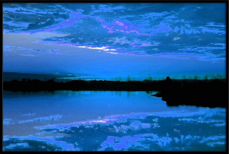 Blue twilight over a calm lake
