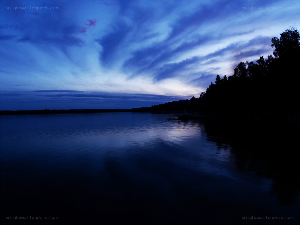 Blue twilight over a calm lake