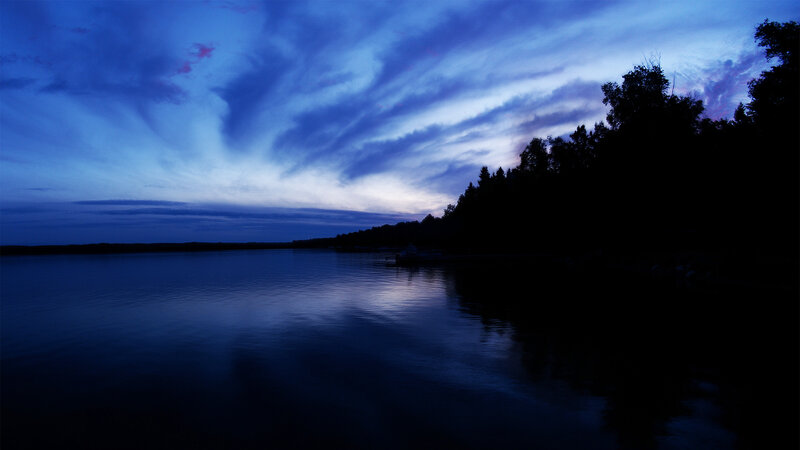 Blue twilight over a calm lake