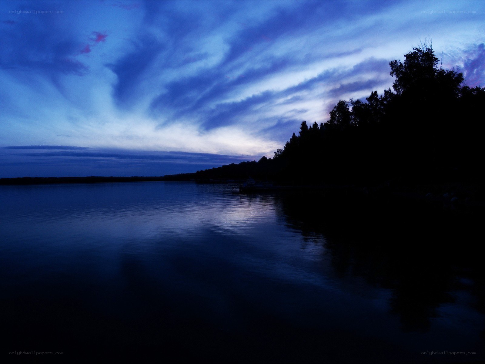 Blue twilight over a calm lake