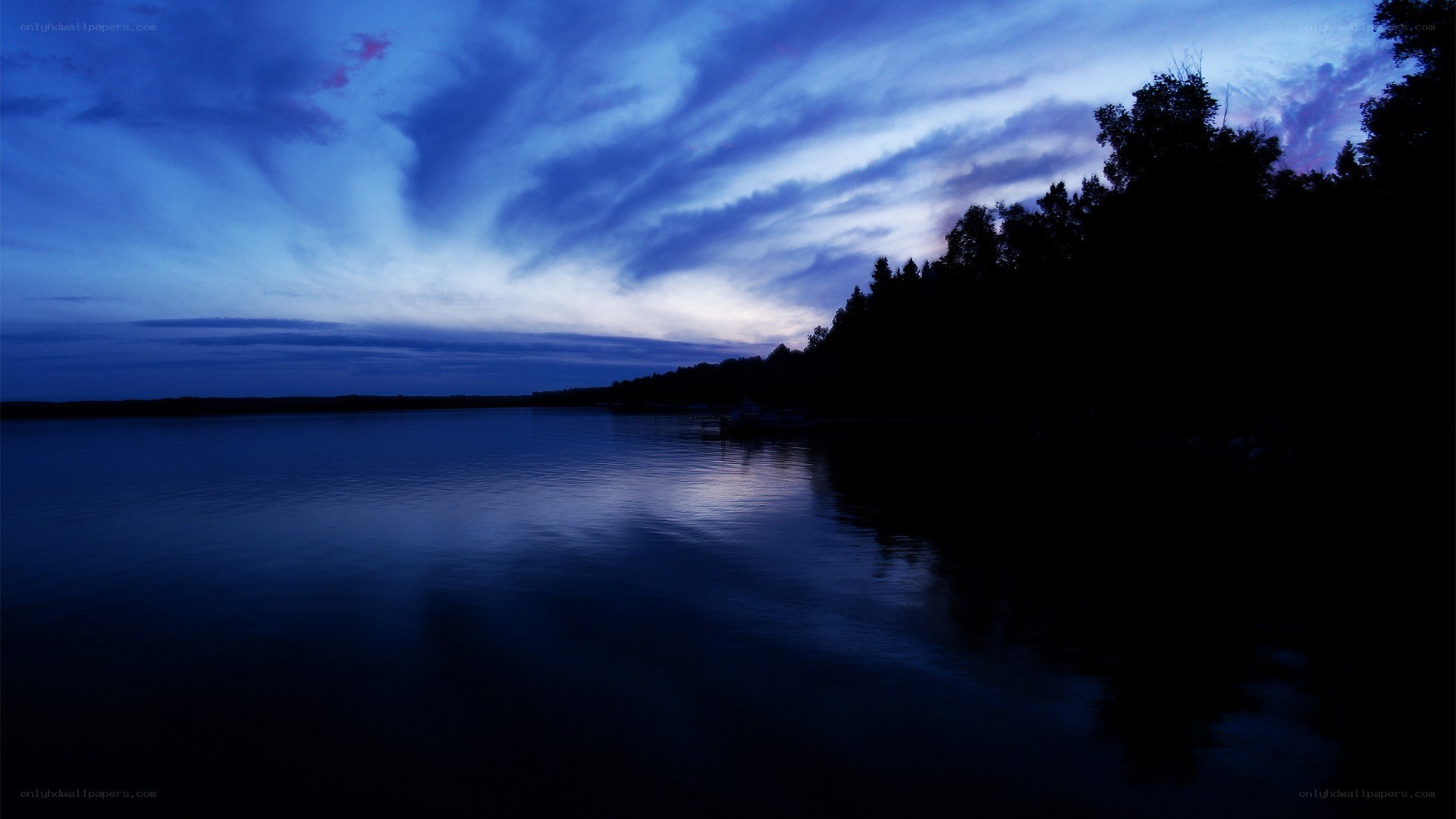 Blue twilight over a calm lake