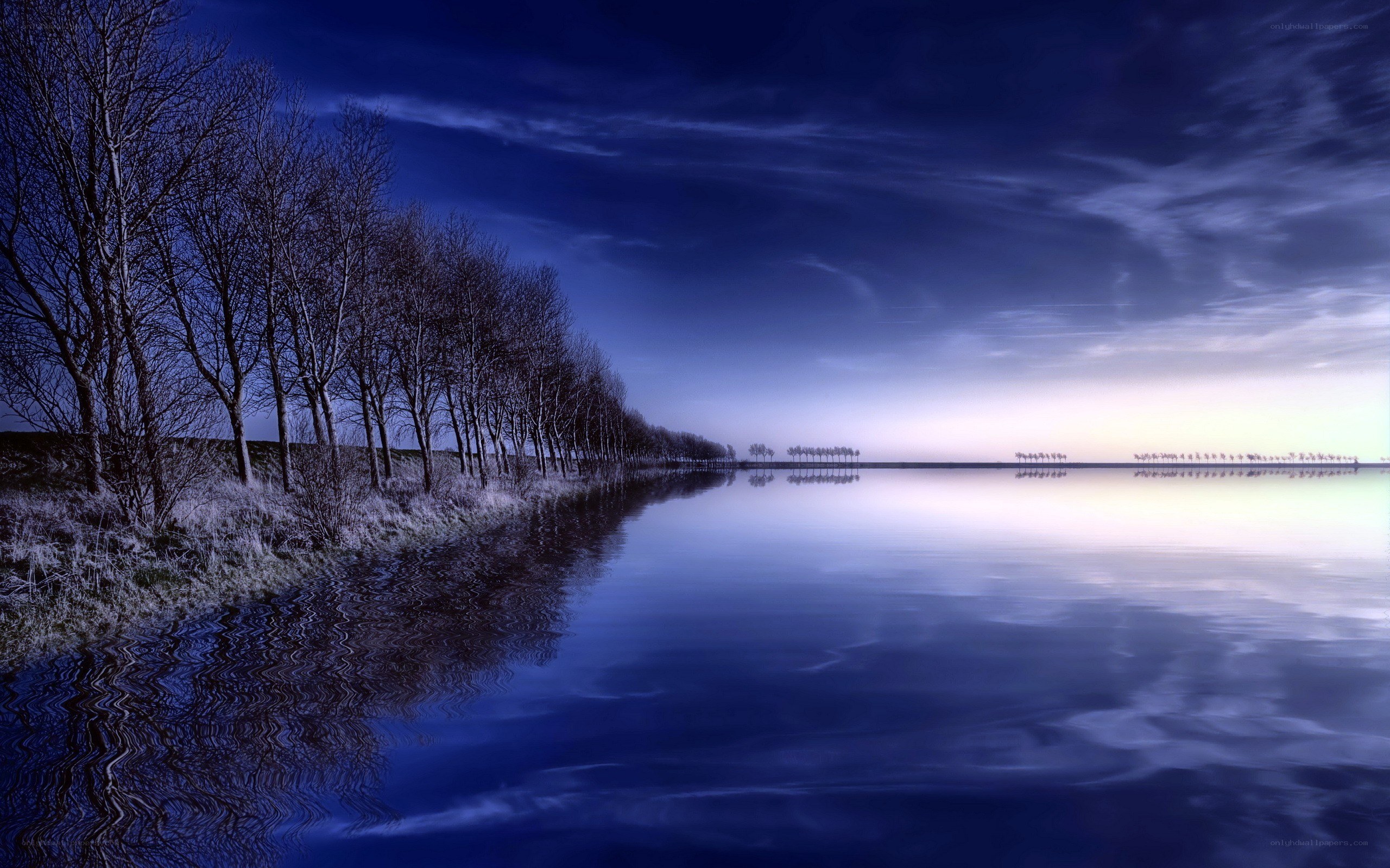 Blue twilight over a calm lake