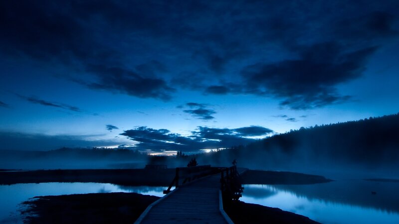 Blue twilight over a misty lake