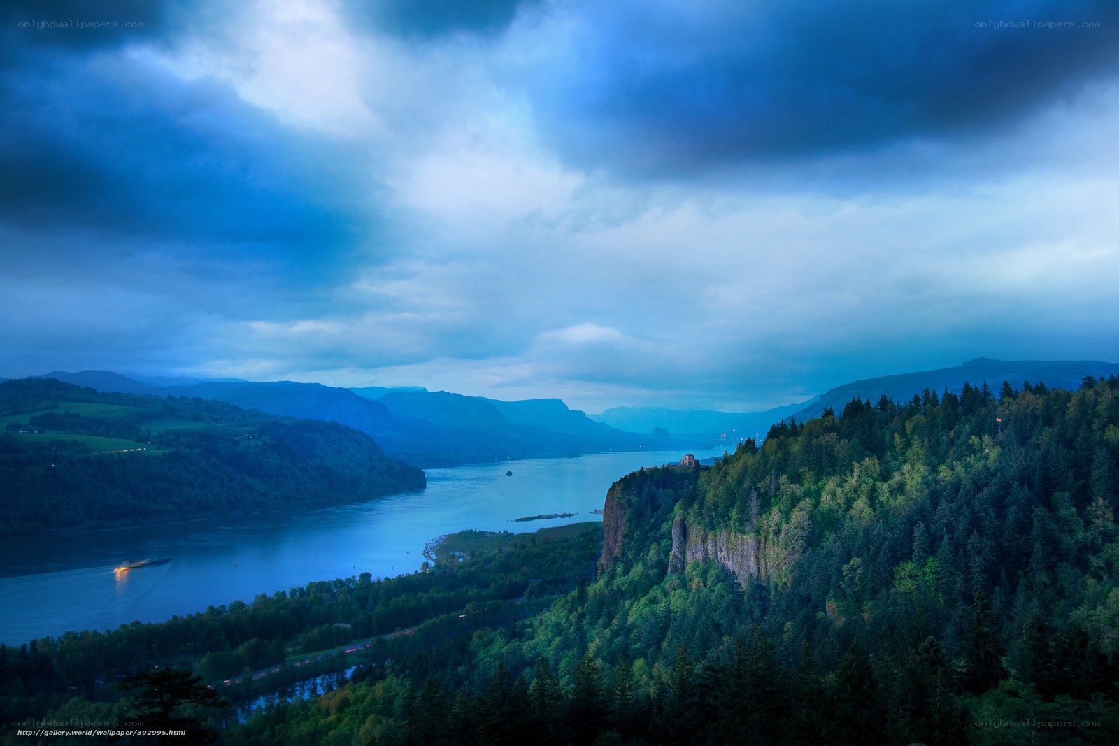 Blue twilight over a river canyon