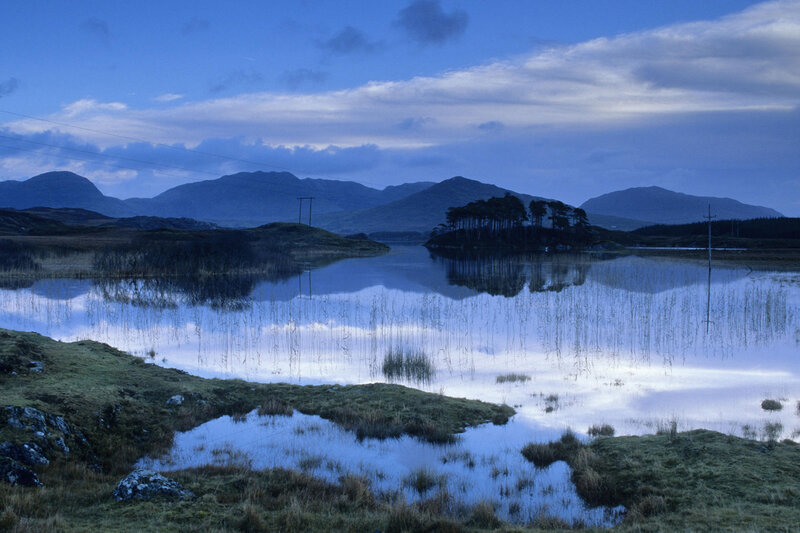 Blue twilight over a Scottish loch