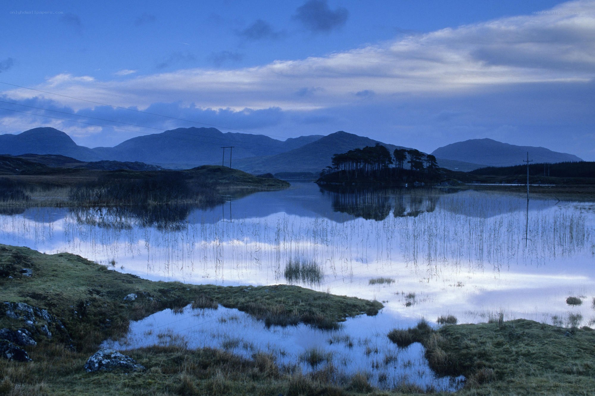 Blue twilight over a Scottish loch