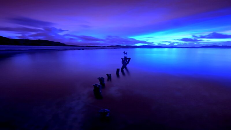 Blue twilight over calm water