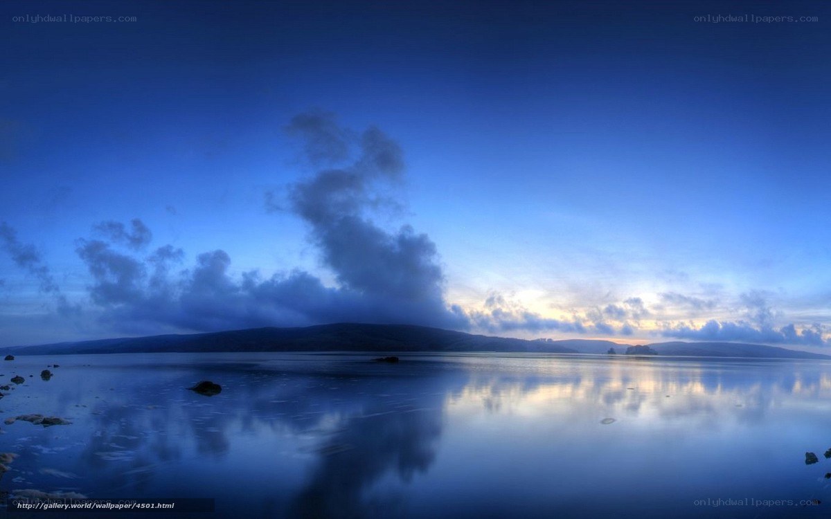 Blue twilight over calm waters