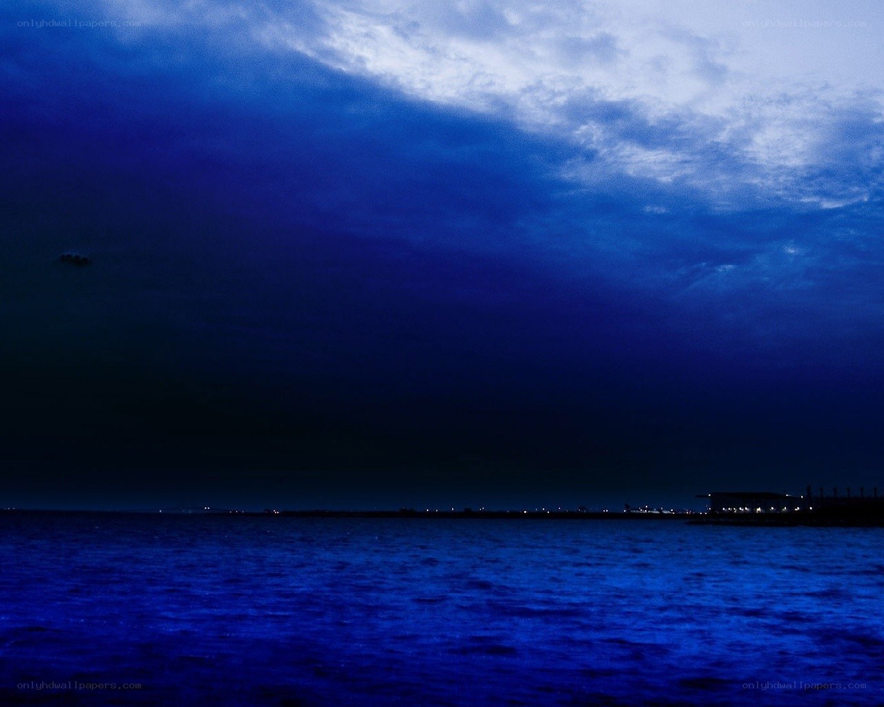 Blue twilight over the water