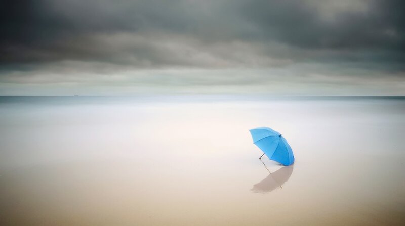 Blue Umbrella on Beach — Dramatic