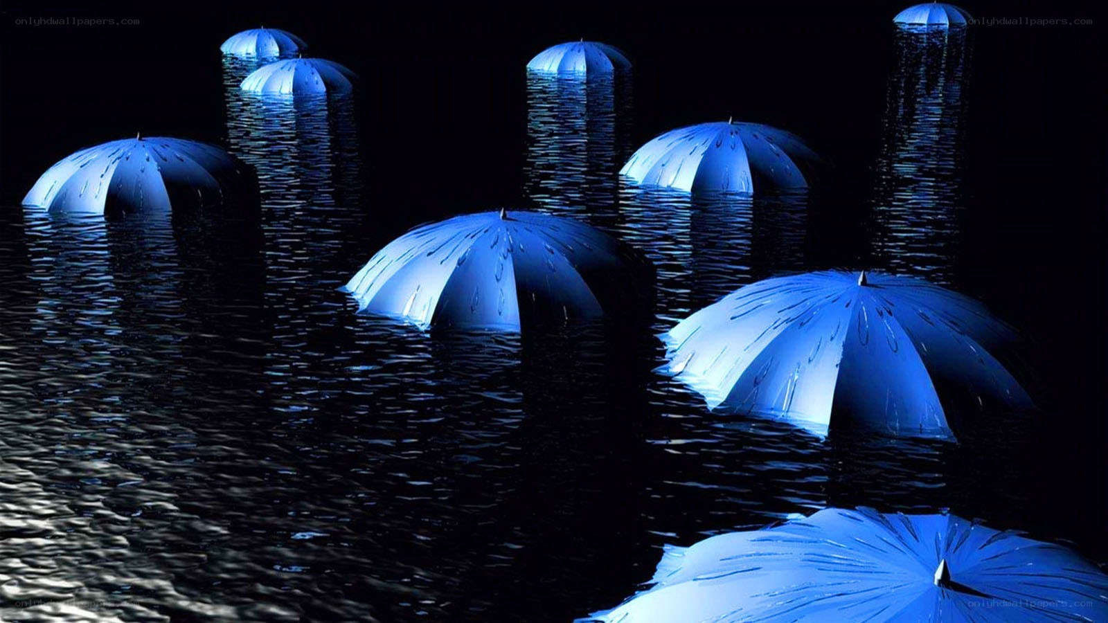 Blue umbrellas in water