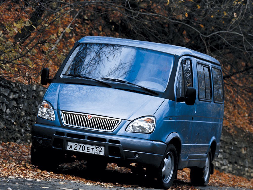 Blue van on autumn road