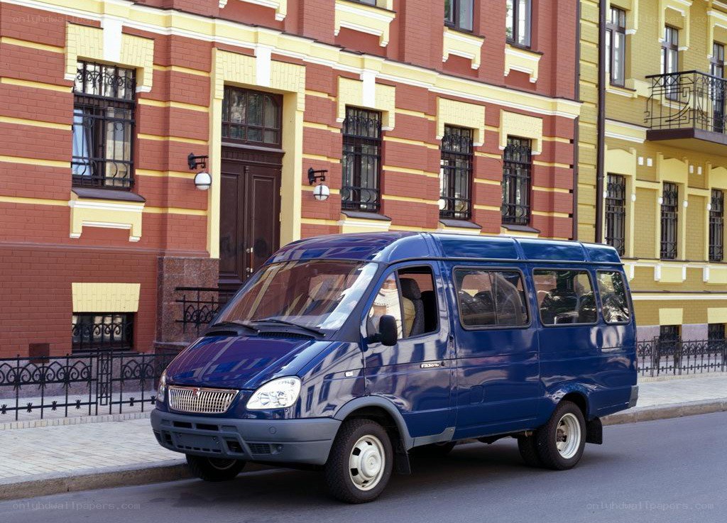 Blue van on city street