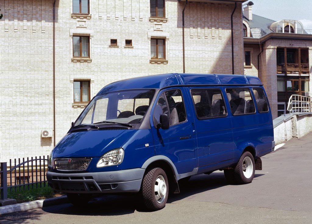 blue van parked on street
