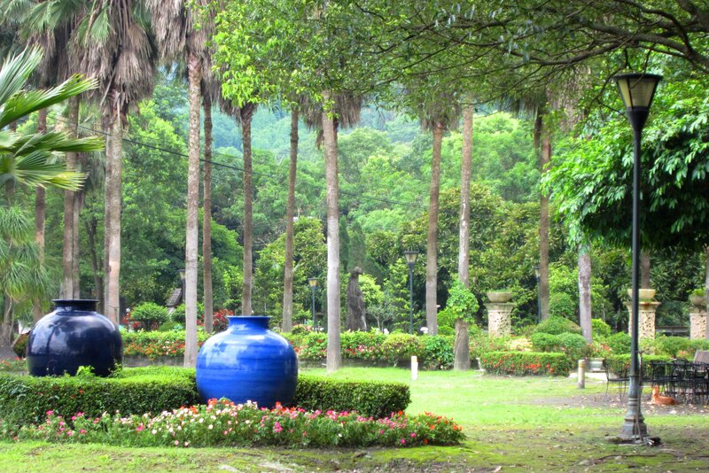 Blue Vases in Garden