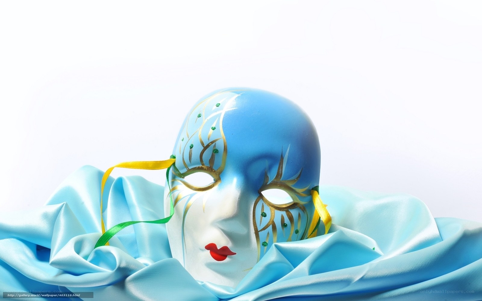 Blue Venetian mask on fabric