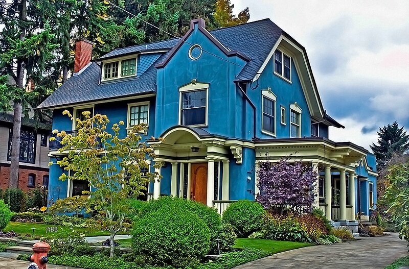 blue victorian house with porch