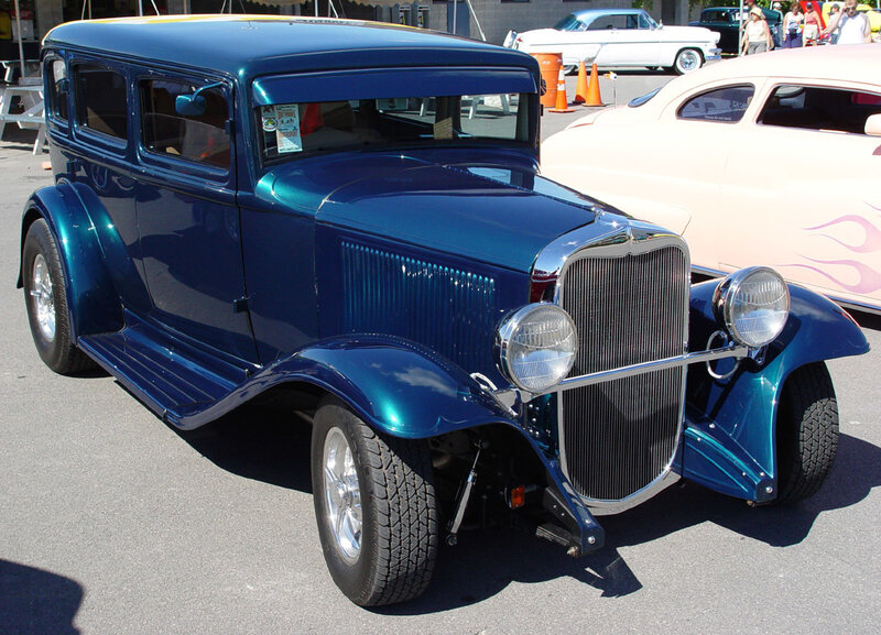 Blue vintage car at a show