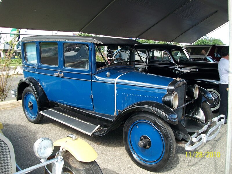 Blue vintage car at a show