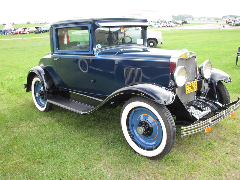 Blue Vintage Car — Calm, Afternoon, Photograph, Grass Field