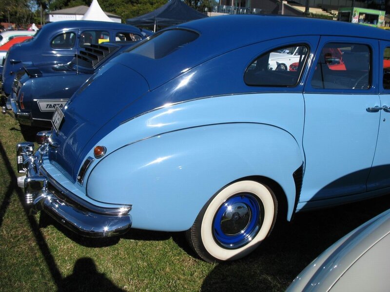 Blue Vintage Car — Calm, Afternoon, Photograph, Grass, Tents