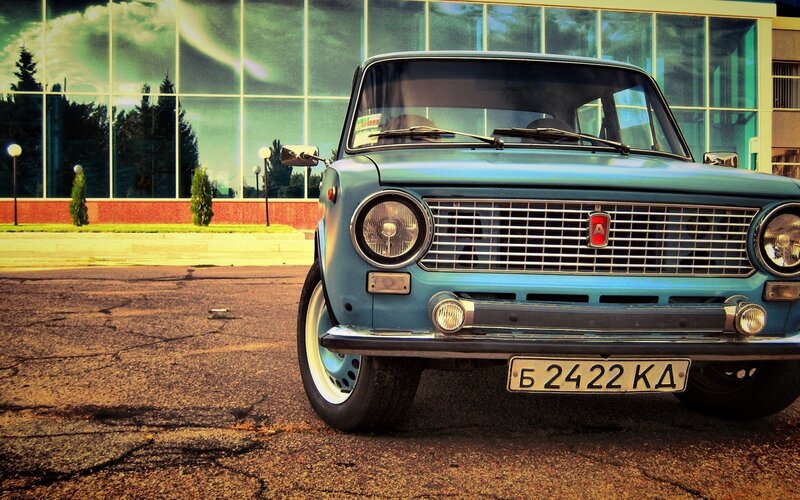 Blue Vintage Car — Dramatic, Afternoon, Photograph, Building