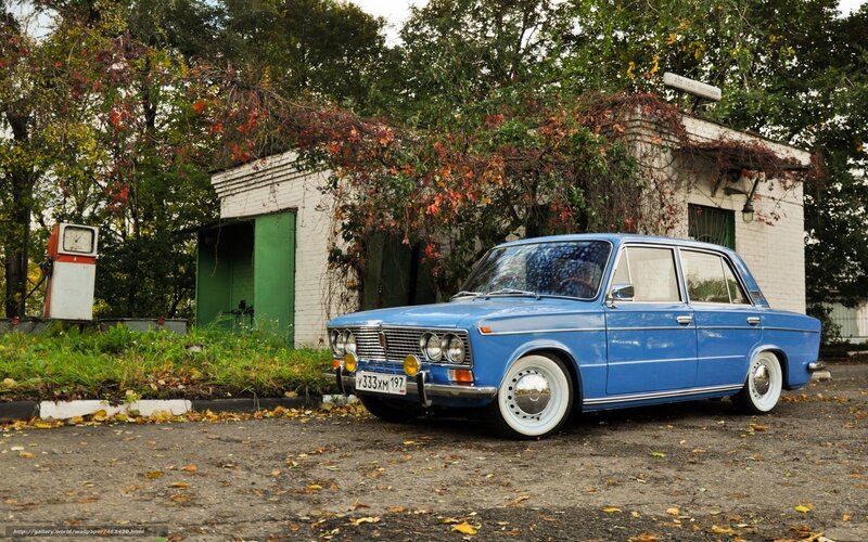 Blue vintage car in autumn