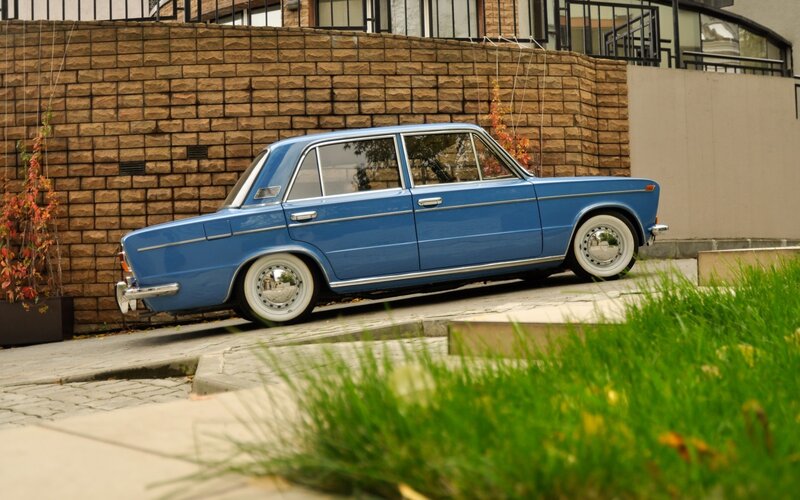 Blue vintage car on a driveway