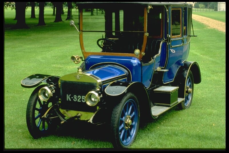 Blue vintage car on grass
