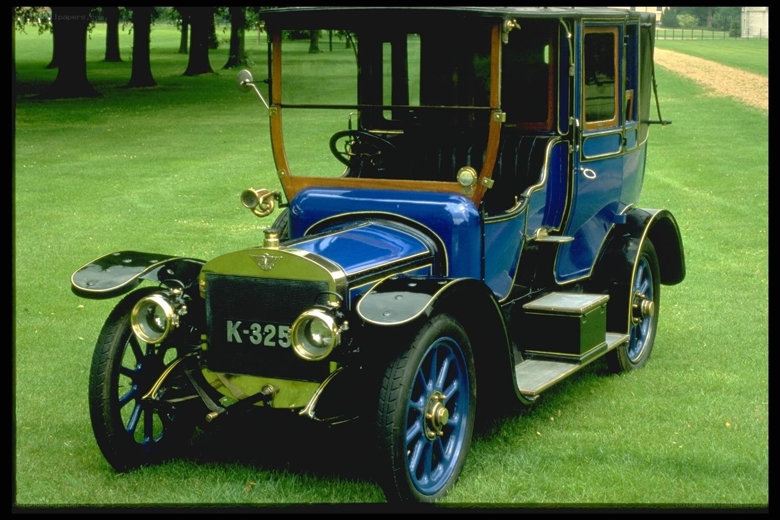 Blue vintage car on grass