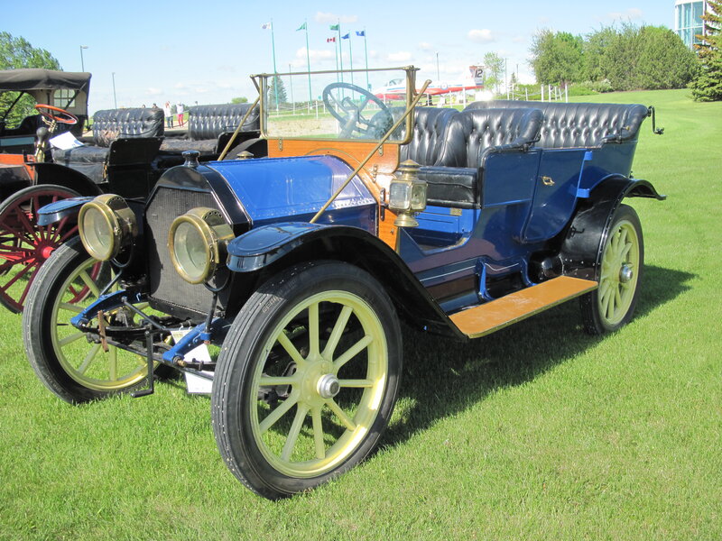 Blue Vintage Car — Serene, Afternoon, Photograph, Grass Field