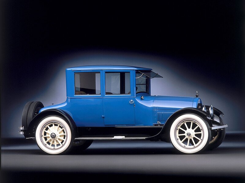 Blue vintage car side profile