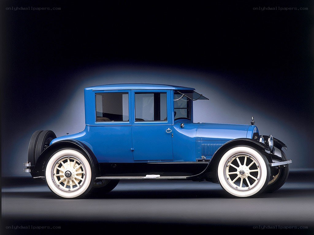 Blue vintage car side profile