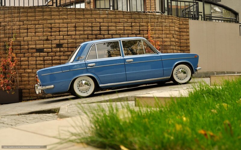 Blue vintage sedan parked