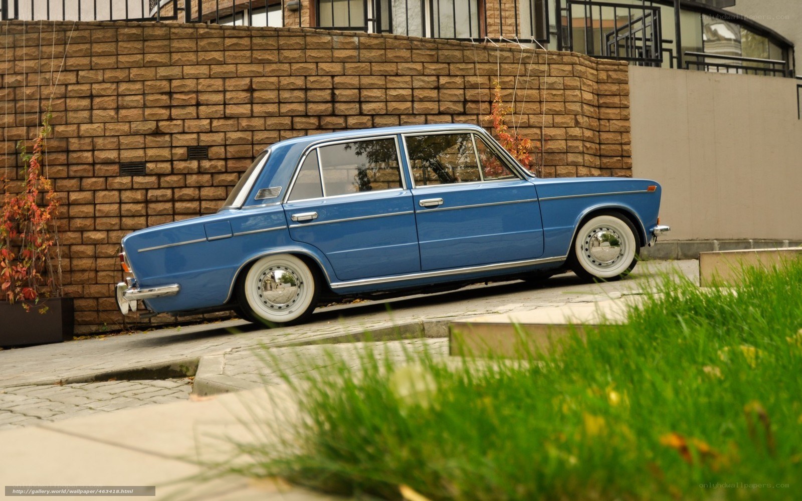 Blue vintage sedan parked