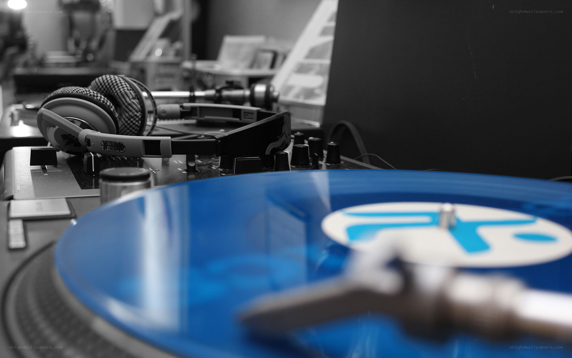 Blue vinyl record on turntable