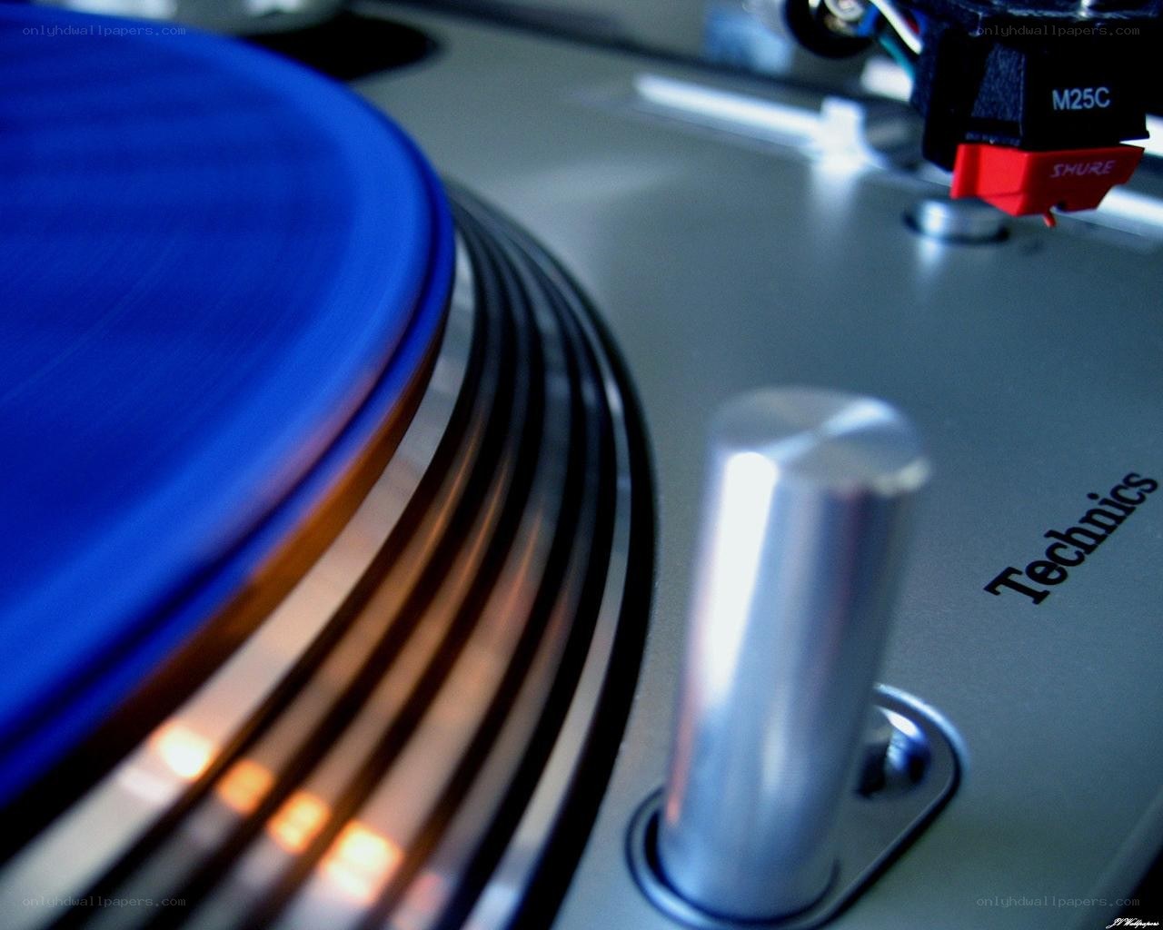 blue vinyl record on turntable