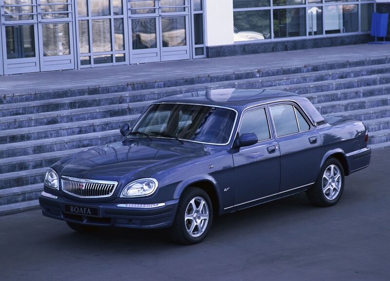 Blue Volga sedan on steps